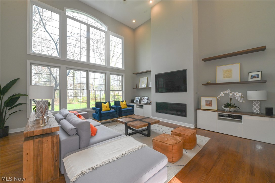 1688 Sheridan Road South Euclid, OH 44121 - Photo 6 of 48 Living room featuring hardwood / wood-style floors and a high ceiling