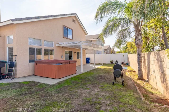 a house view with a backyard space