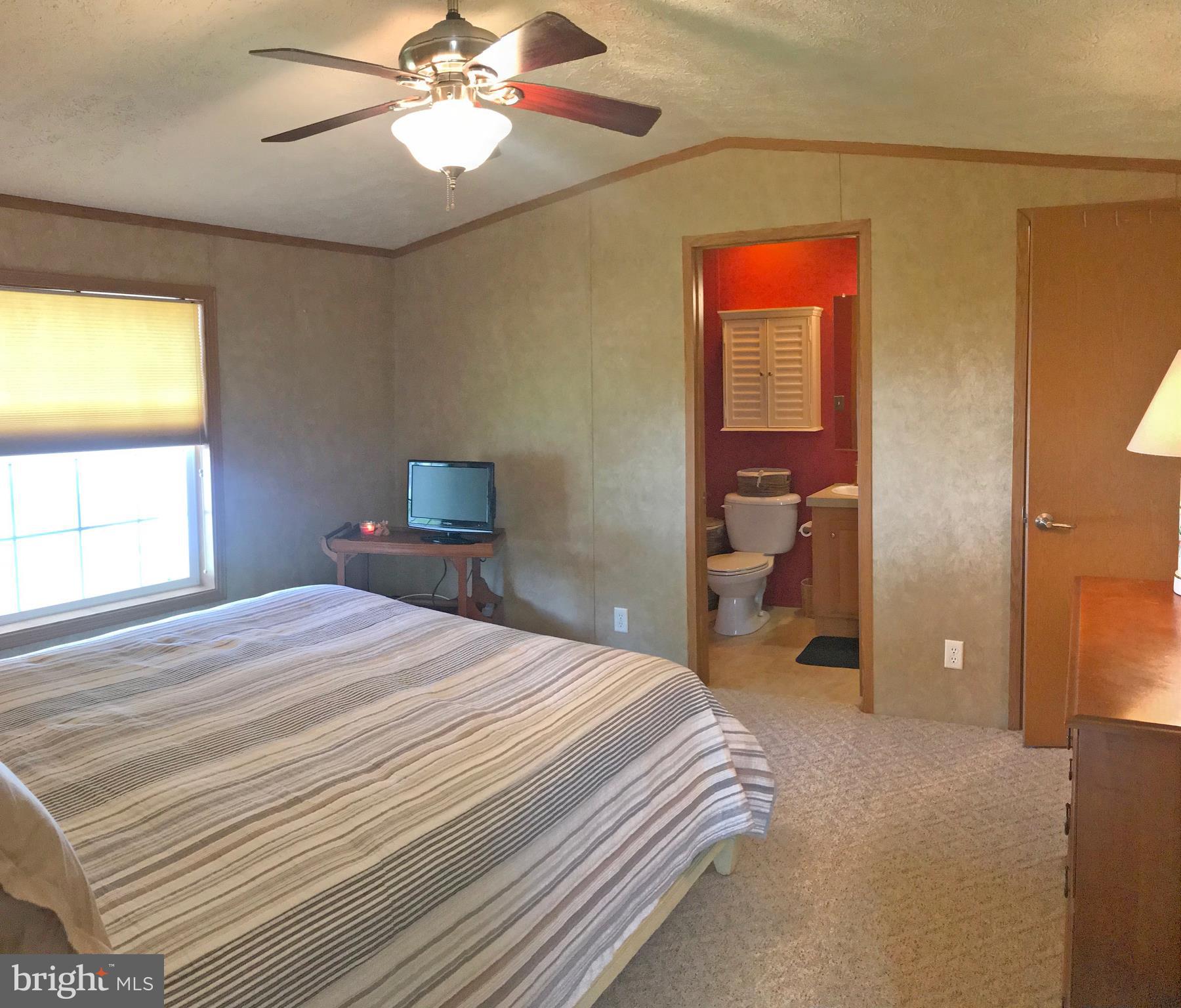 6 Sunnyfield Road Rehoboth Beach, DE 19971 - Photo 5 of 15 Master Bedroom Suite