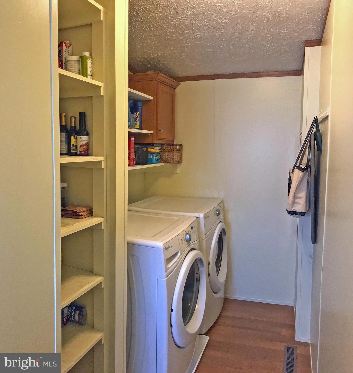 6 Sunnyfield Road Rehoboth Beach, DE 19971 - Photo 10 of 15 Laundry Room with Pantry Shelving