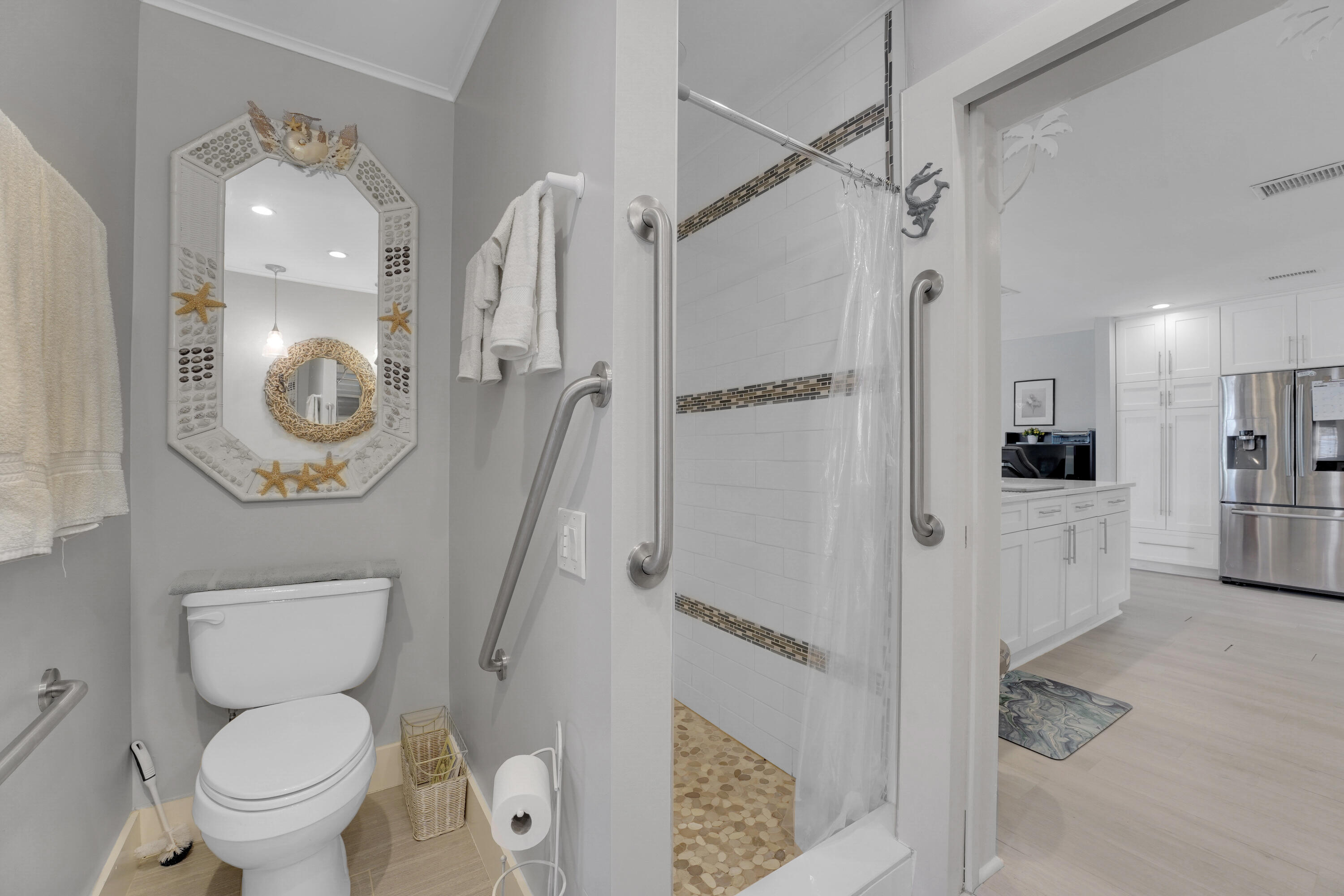 1708 Sunset Isles Road Fort Pierce, FL 34949 - Photo 24 of 52 a bathroom with a toilet a sink and a shower