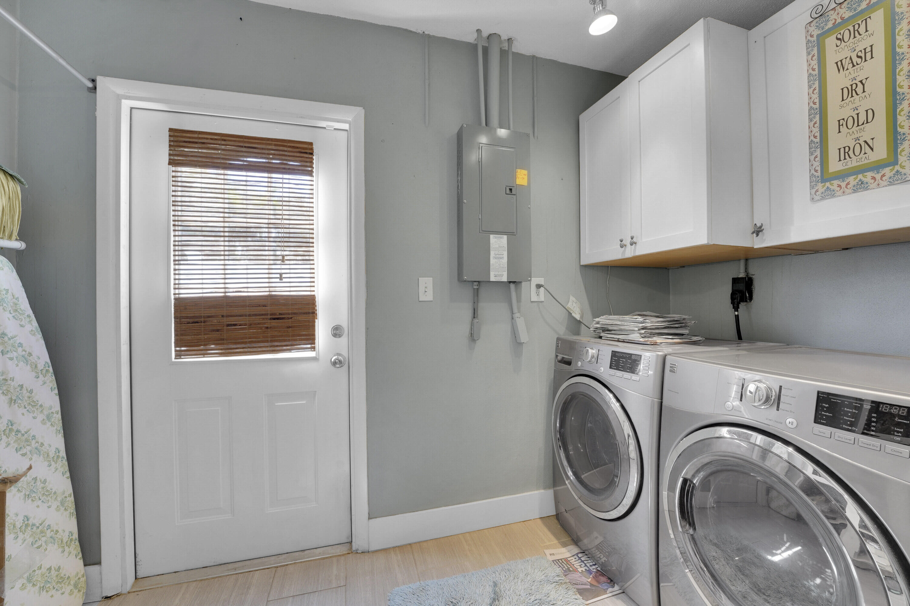 1708 Sunset Isles Road Fort Pierce, FL 34949 - Photo 25 of 52 a view of storage and utility room with washer and dryer