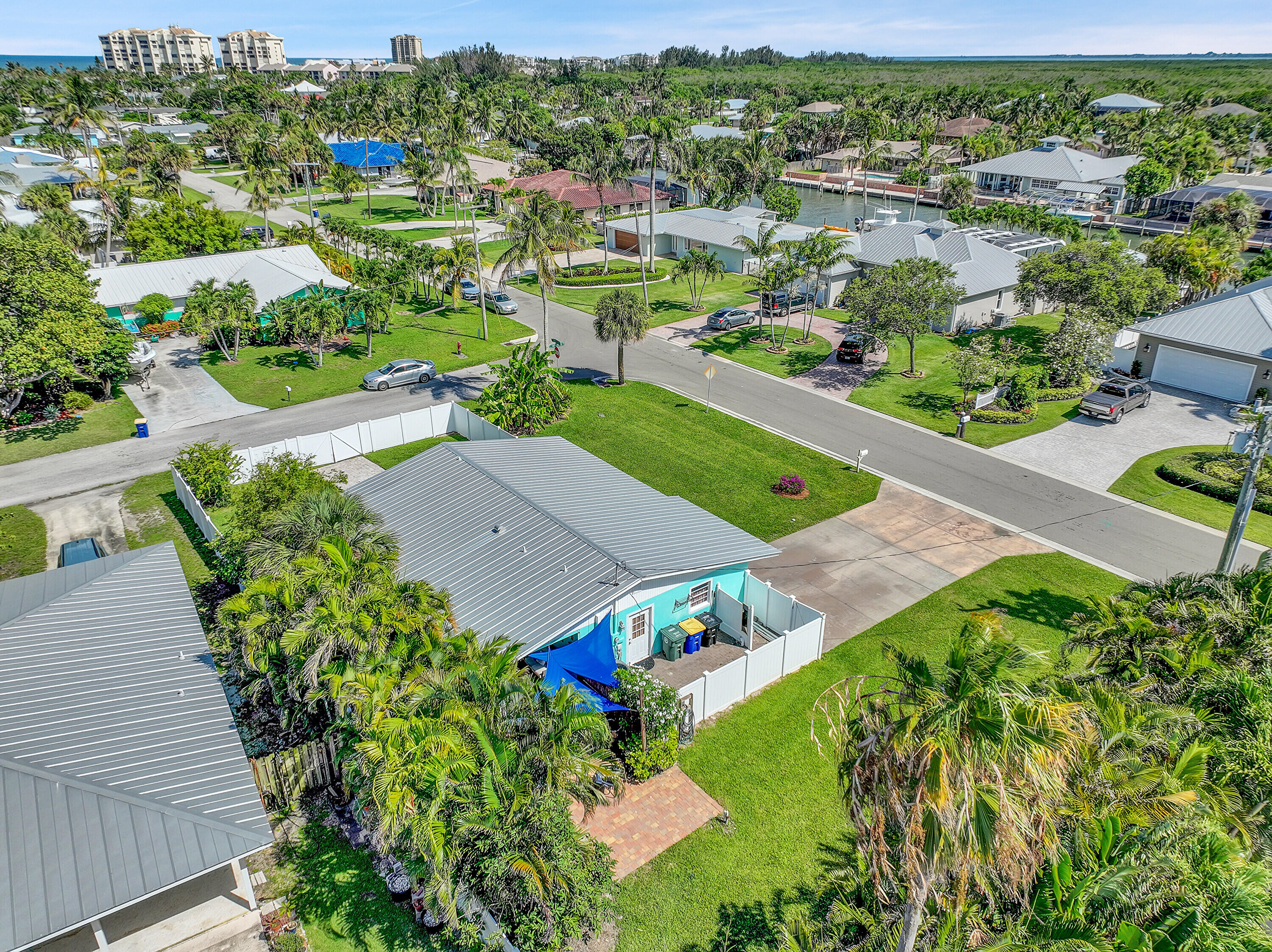1708 Sunset Isles Road Fort Pierce, FL 34949 - Photo 42 of 52 an aerial view of a house with yard swimming pool and outdoor seating