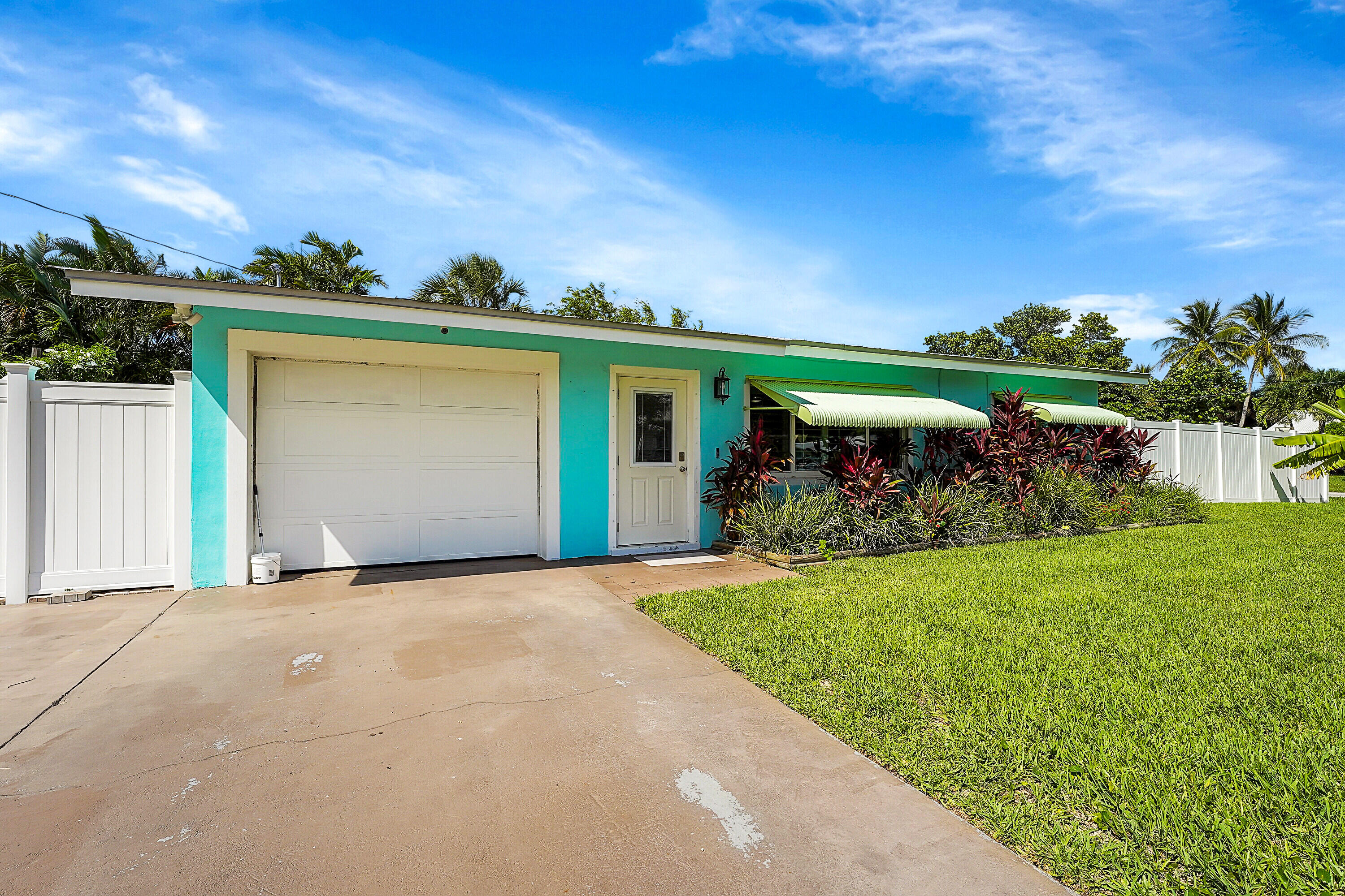 1708 Sunset Isles Road Fort Pierce, FL 34949 - Photo 7 of 52 a view of a house with a backyard