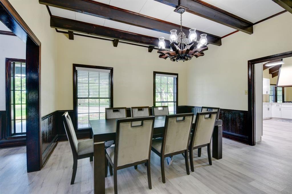 11470 Massey Road Pilot Point, TX 76258 - Photo 27 of 39 a view of a dining room with furniture window and wooden floor
