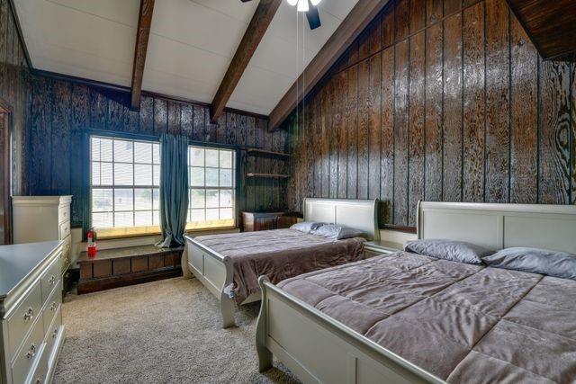 11470 Massey Road Pilot Point, TX 76258 - Photo 10 of 39 a bedroom with two beds and a window