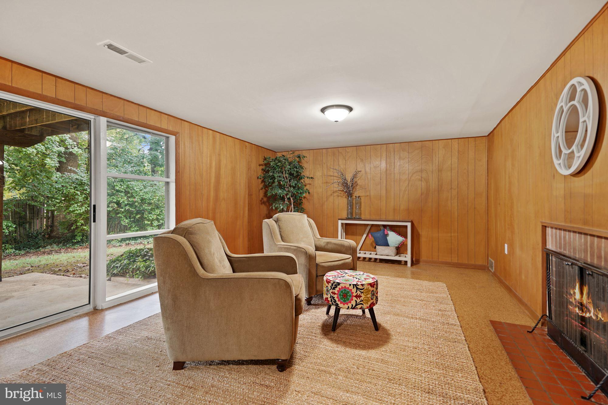 3703 Sprucedale Drive Annandale, VA 22003 - Photo 11 of 41 Lots of light with a fireplace to warm the room