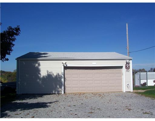 523 Harmony Road New Brighton, PA 15066 - Photo 2 of 18 Parking Lot/Garage. 30X30 DETACHED GARAGE WITH A FENCED IN DOG AREA TO THE RIGHT.