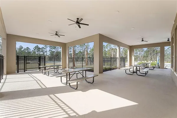 a view of swimming pool with a yard
