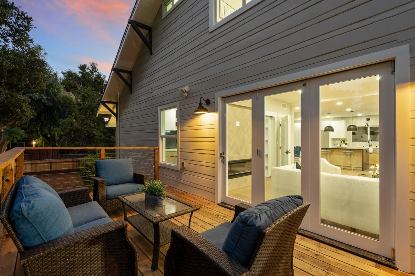 1587 Valota Road Redwood City, CA 94061 - Photo 34 of 42 a balcony with furniture and a potted plant