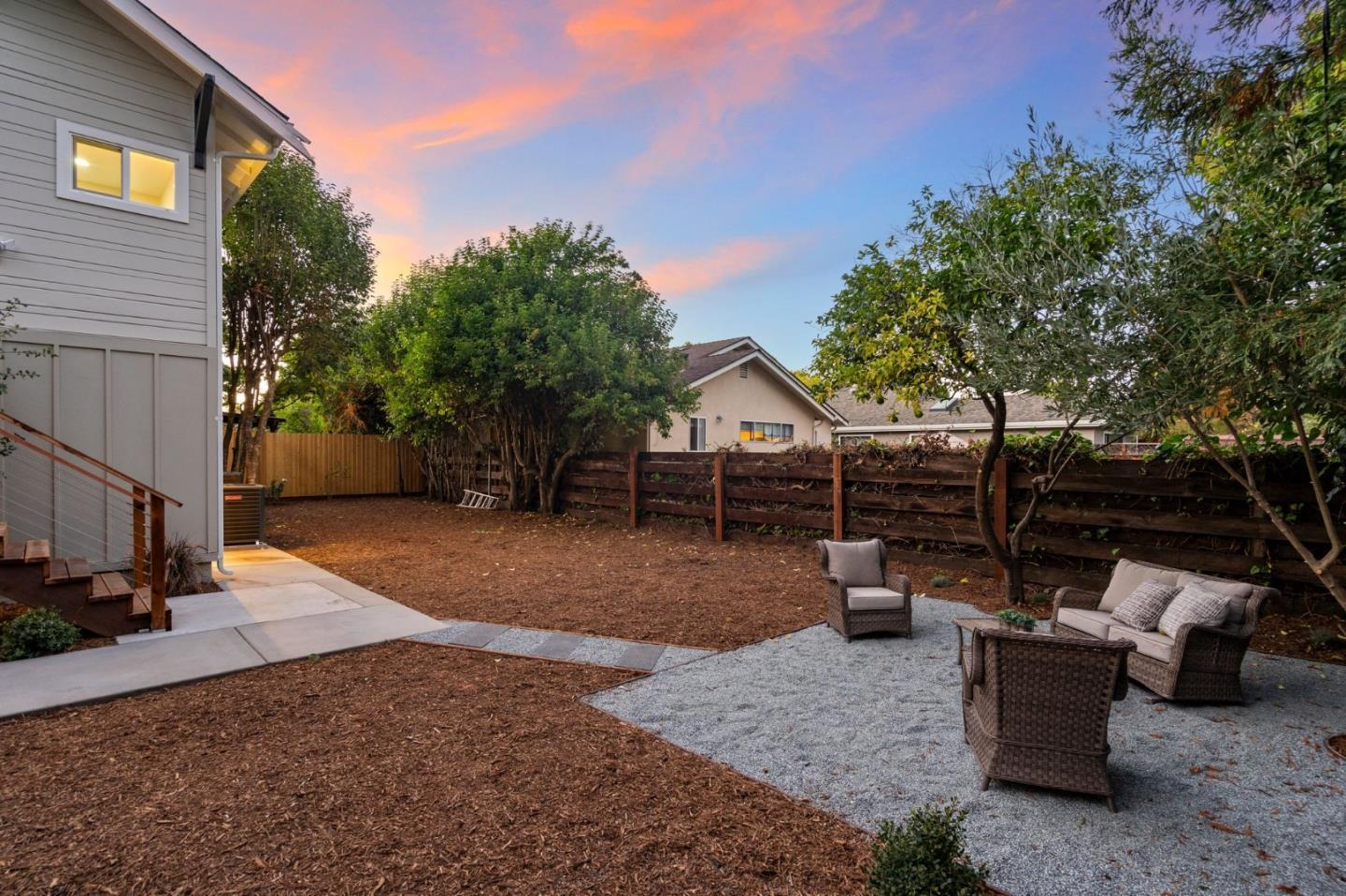 1587 Valota Road Redwood City, CA 94061 - Photo 40 of 42 a view of a patio with furniture and a backyard