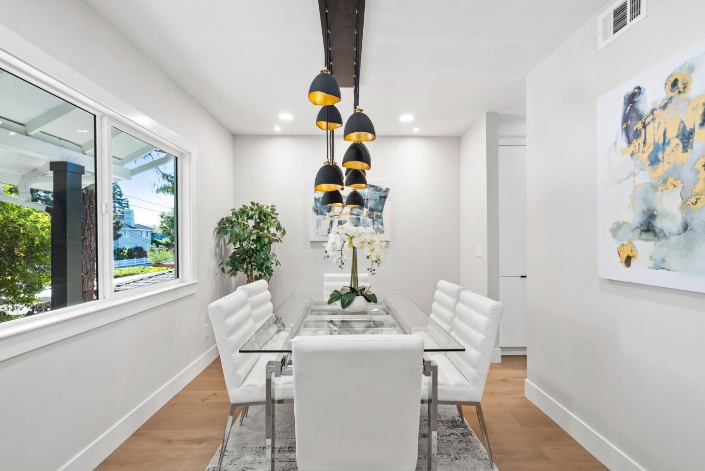 1587 Valota Road Redwood City, CA 94061 - Photo 7 of 42 a dining room with a table and chairs
