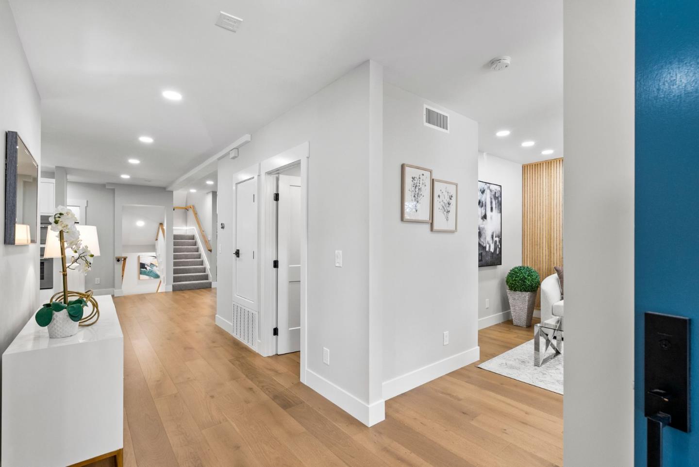1587 Valota Road Redwood City, CA 94061 - Photo 9 of 42 a living room with furniture and a table