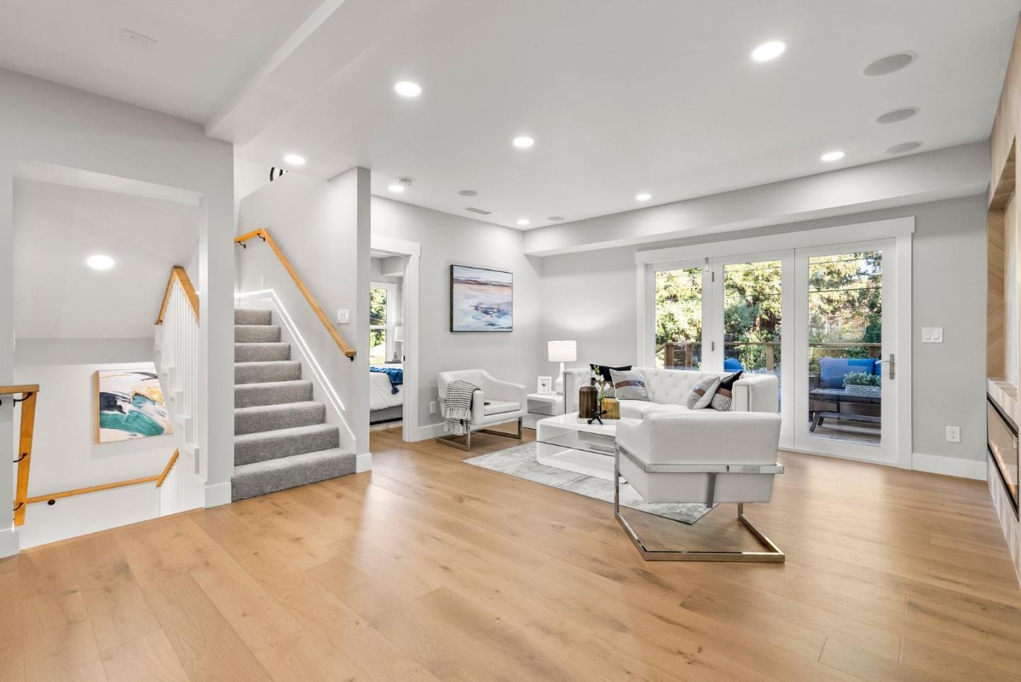 1587 Valota Road Redwood City, CA 94061 - Photo 10 of 42 a living room with furniture and stairs
