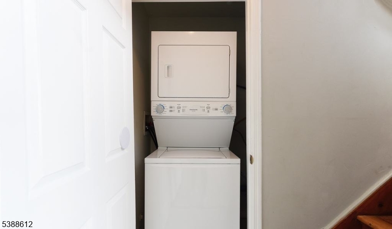 591 Cherry Street, Unit 1 Elizabeth, NJ 07208 - Photo 11 of 12 a utility room with dryer and washer