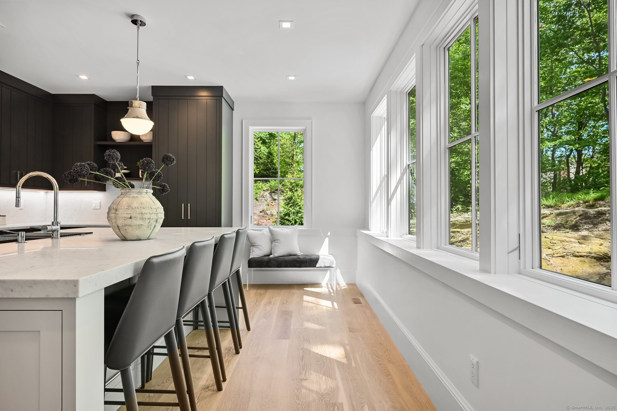 171 Compo Road South Westport, CT 06880 - Photo 11 of 39 a dining room with furniture and a large window