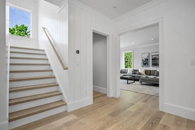 a spacious bedroom with a bed and window