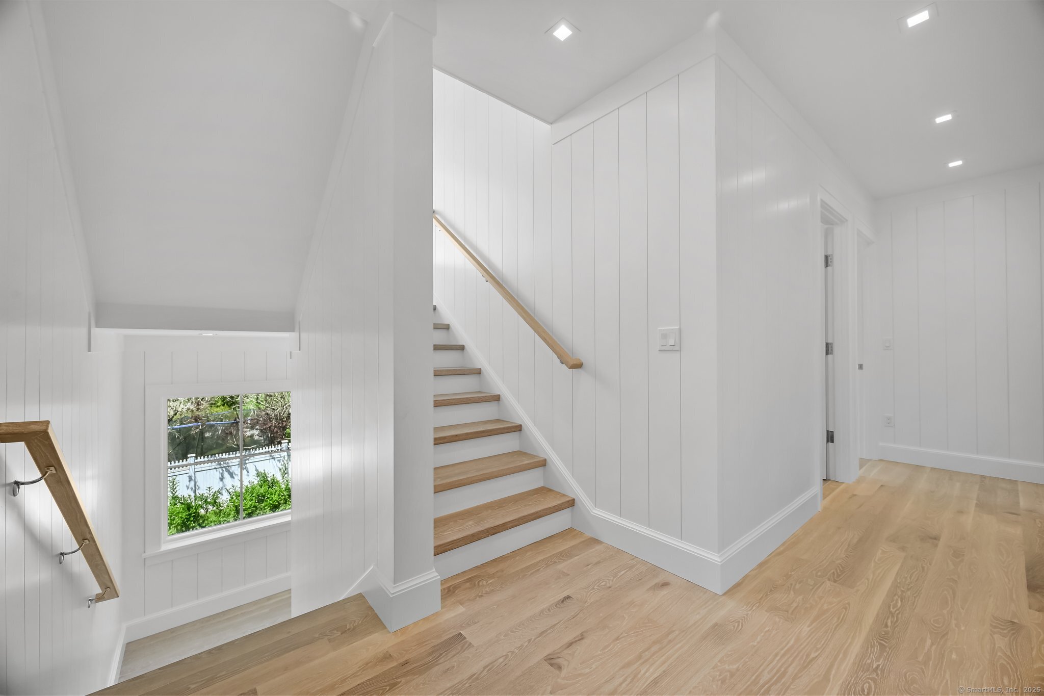 171 Compo Road South Westport, CT 06880 - Photo 16 of 39 a view of a hallway with wooden floor and entryway