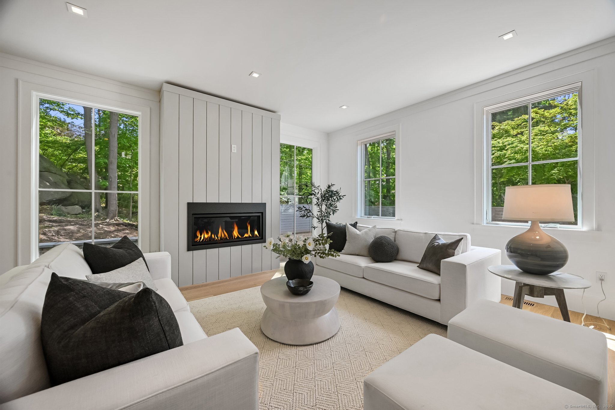 171 Compo Road South Westport, CT 06880 - Photo 2 of 39 a living room with furniture and a fireplace