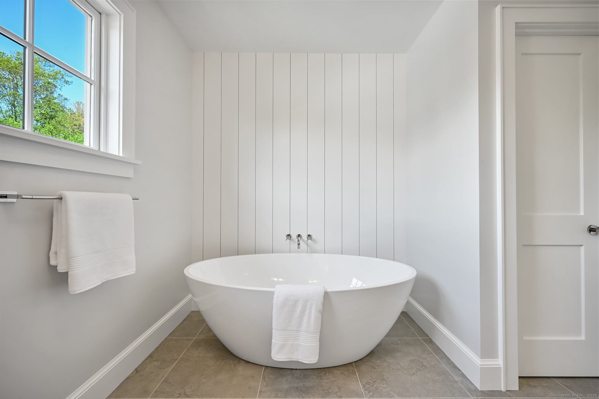 171 Compo Road South Westport, CT 06880 - Photo 21 of 39 a white bath tub sitting in a bathroom