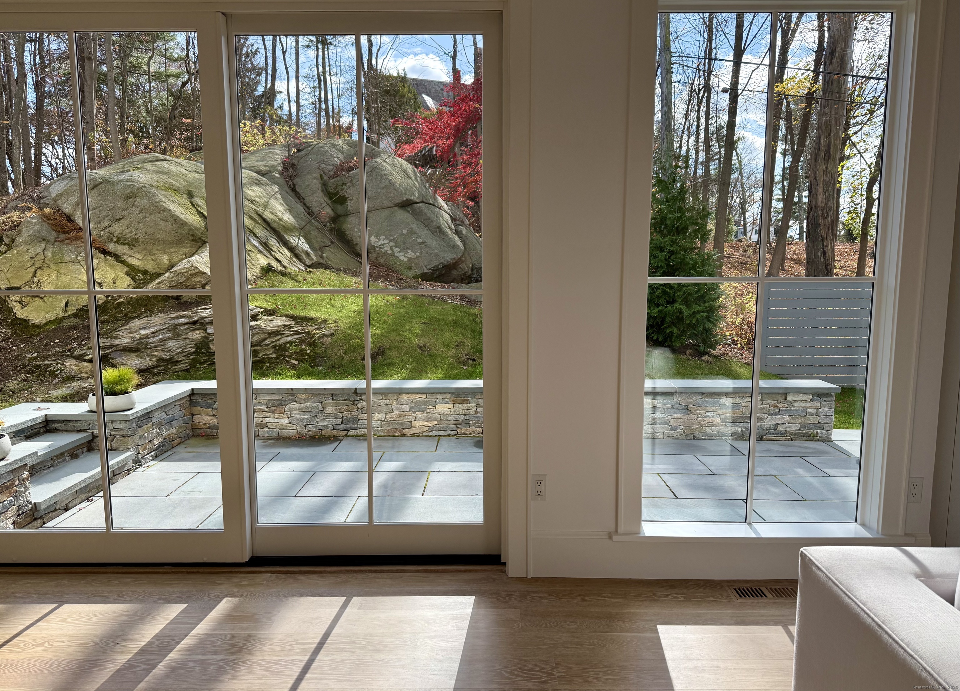 171 Compo Road South Westport, CT 06880 - Photo 3 of 39 a view of a room that has a big window