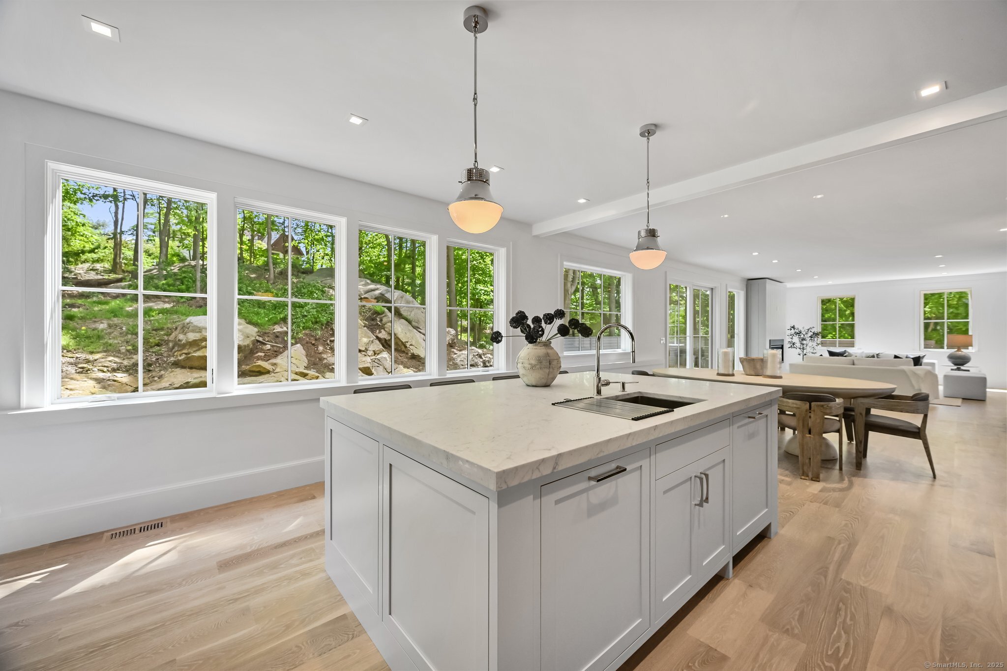 171 Compo Road South Westport, CT 06880 - Photo 9 of 39 a kitchen with a sink and wooden floor