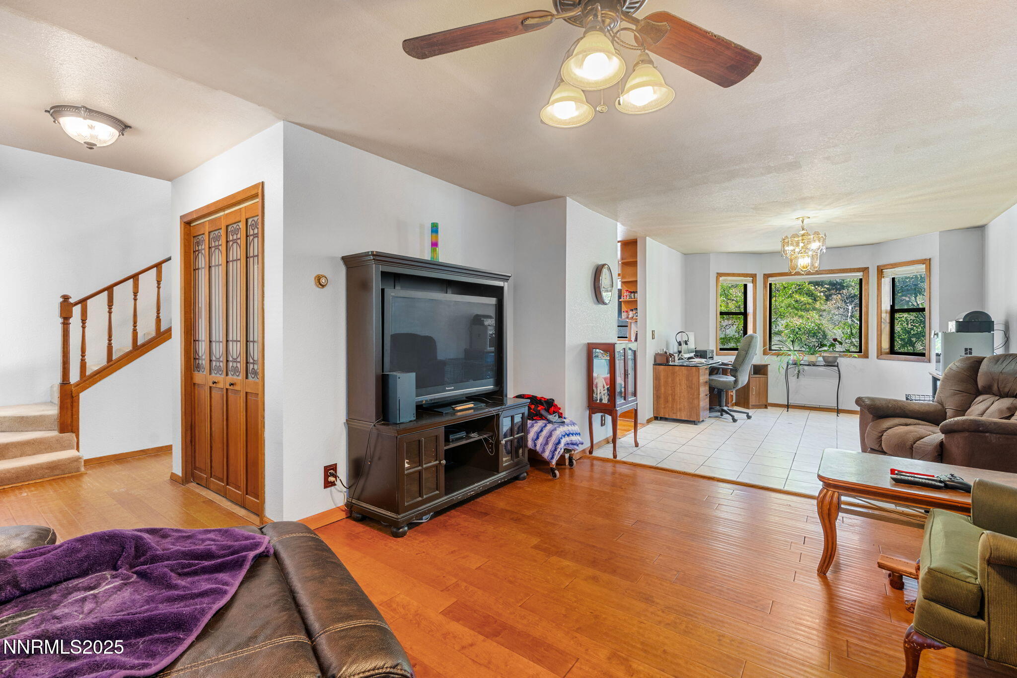 21615 Dortort Drive Reno, NV 89521 - Photo 13 of 52 a living room with furniture and a flat screen tv