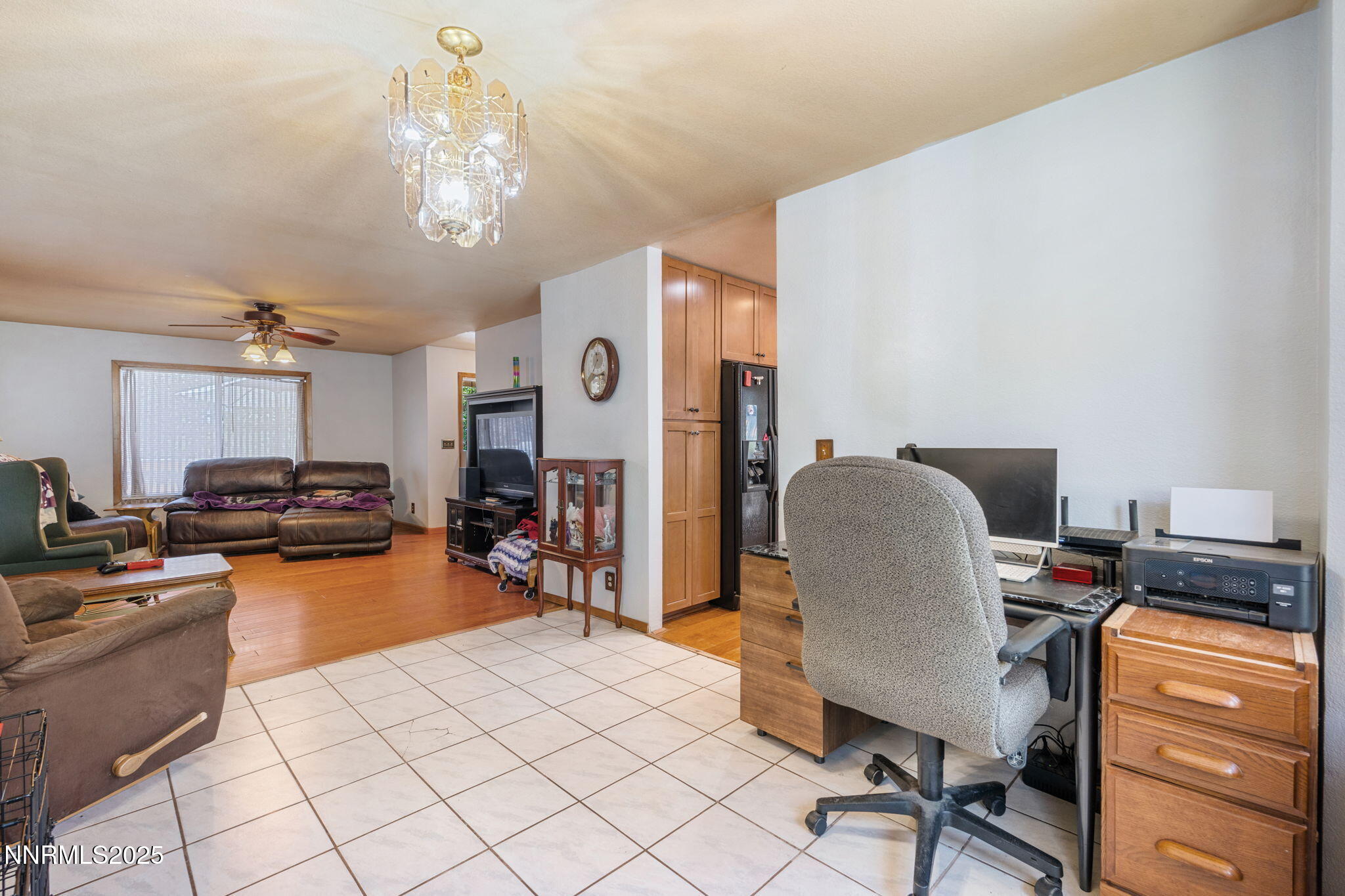 21615 Dortort Drive Reno, NV 89521 - Photo 18 of 52 a view of a workspace with furniture and a livingroom