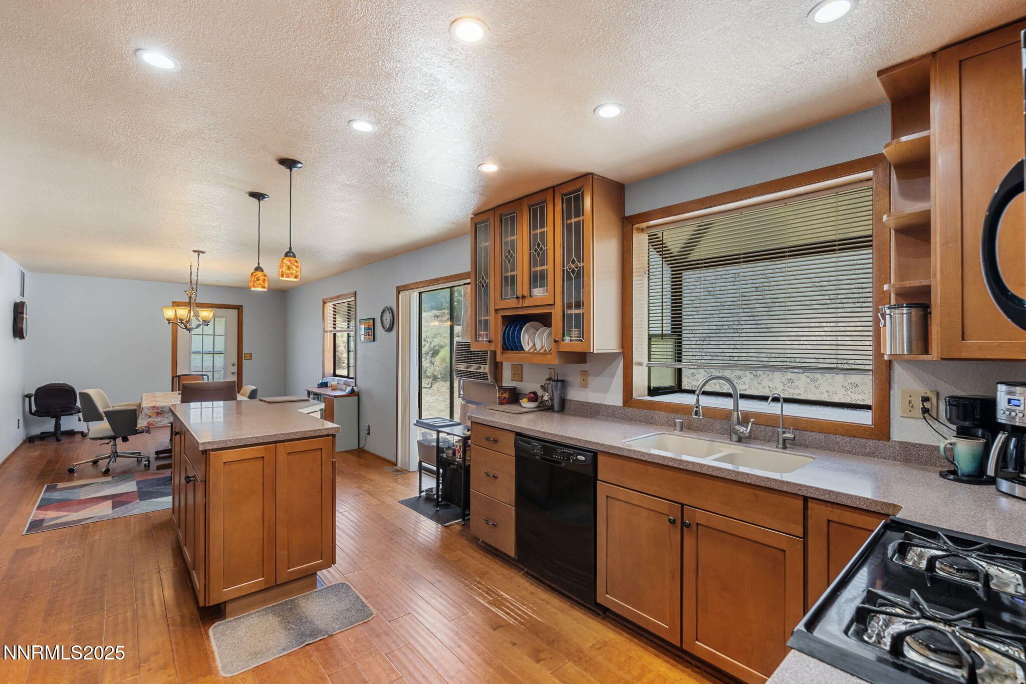 21615 Dortort Drive Reno, NV 89521 - Photo 25 of 52 a large kitchen with lots of counter space a sink and appliances