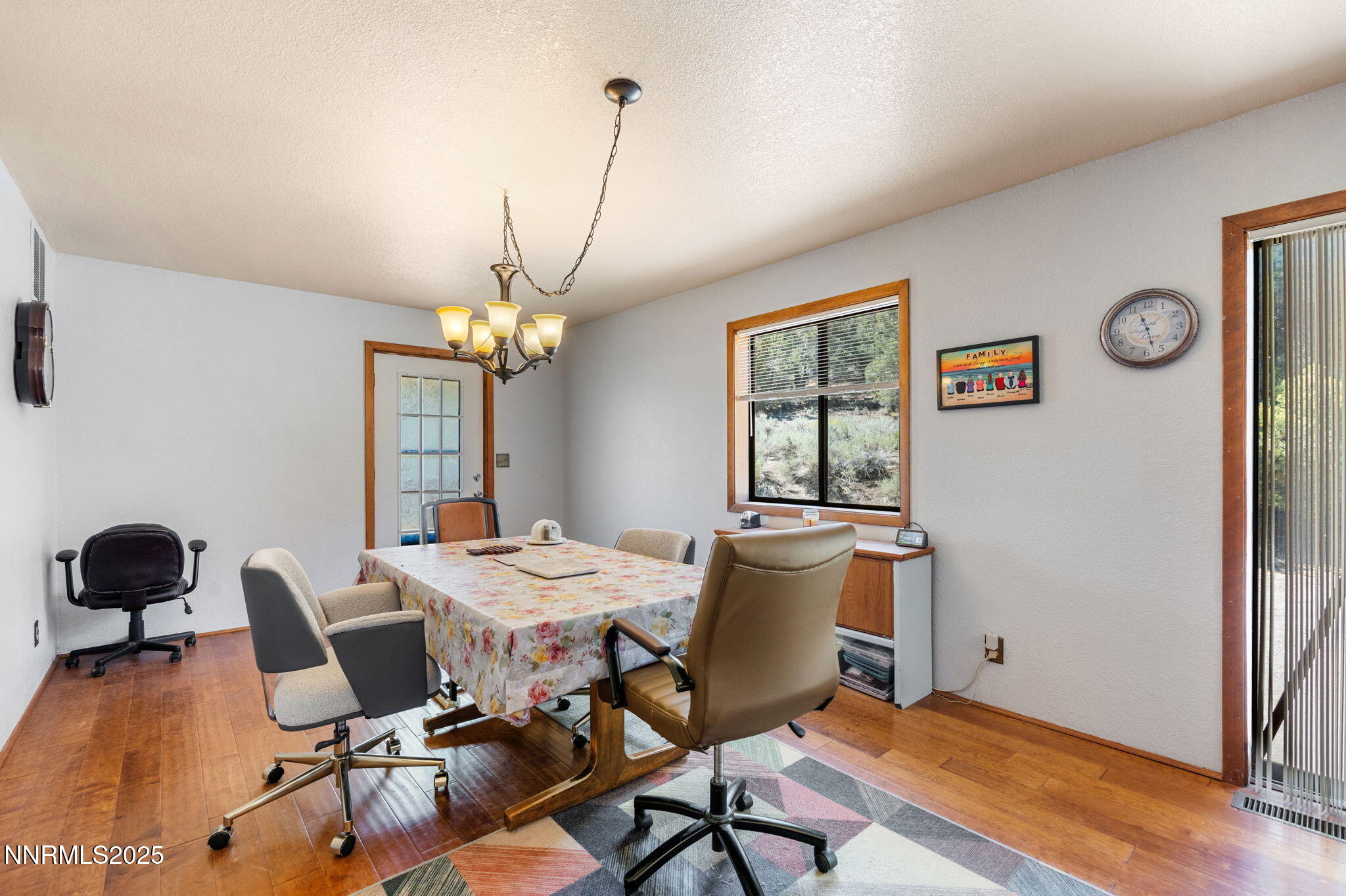 21615 Dortort Drive Reno, NV 89521 - Photo 28 of 52 a view of a dining room with furniture window and wooden floor