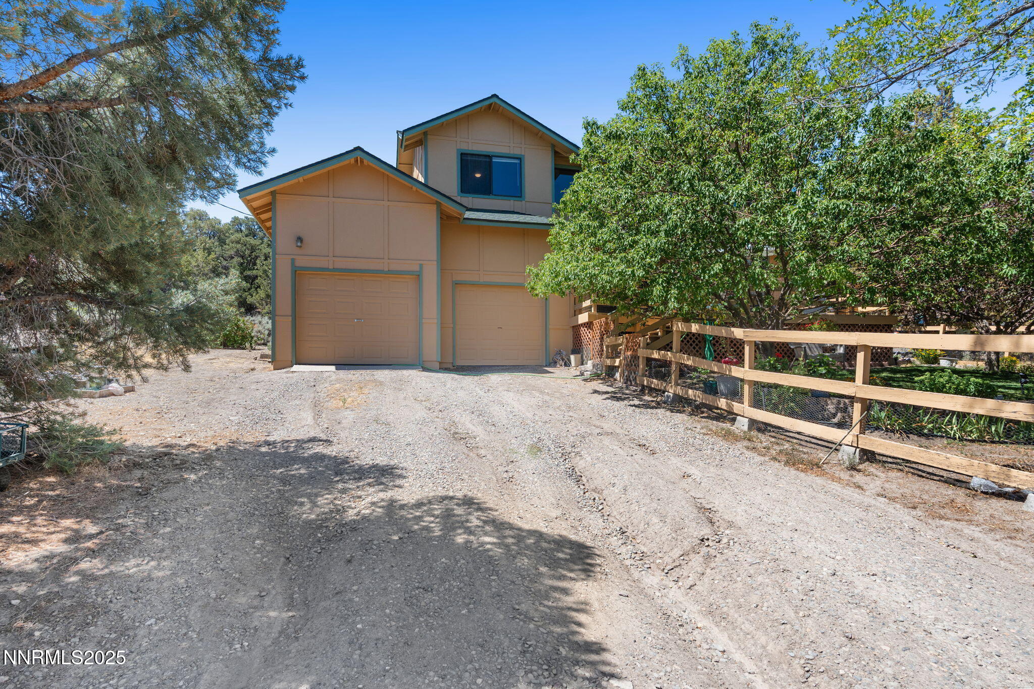 21615 Dortort Drive Reno, NV 89521 - Photo 3 of 52 a view of a house with a yard and large tree