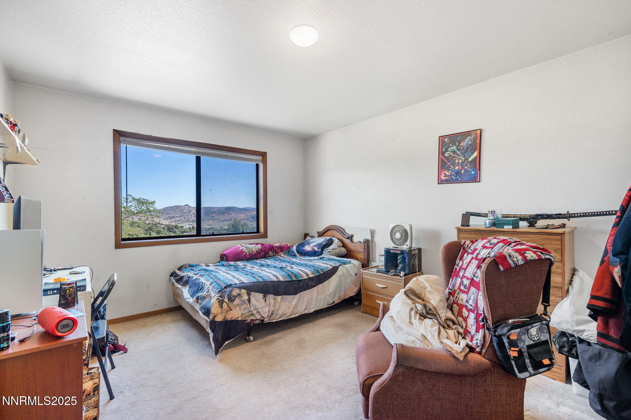21615 Dortort Drive Reno, NV 89521 - Photo 35 of 52 a living room with furniture and a window