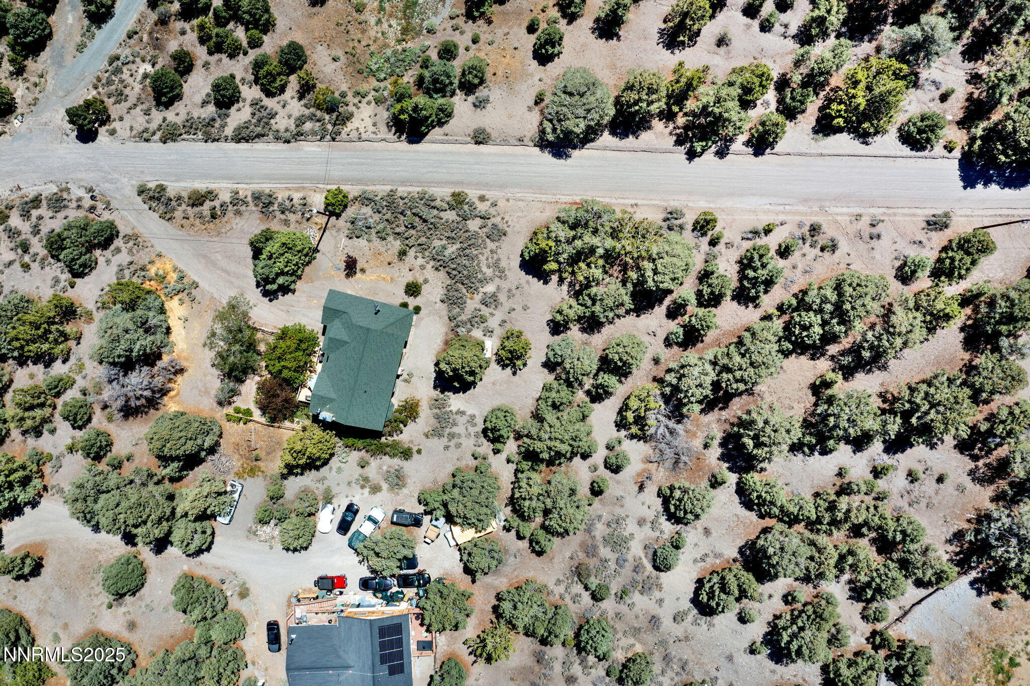 21615 Dortort Drive Reno, NV 89521 - Photo 52 of 52 a view of a wooden house with a yard