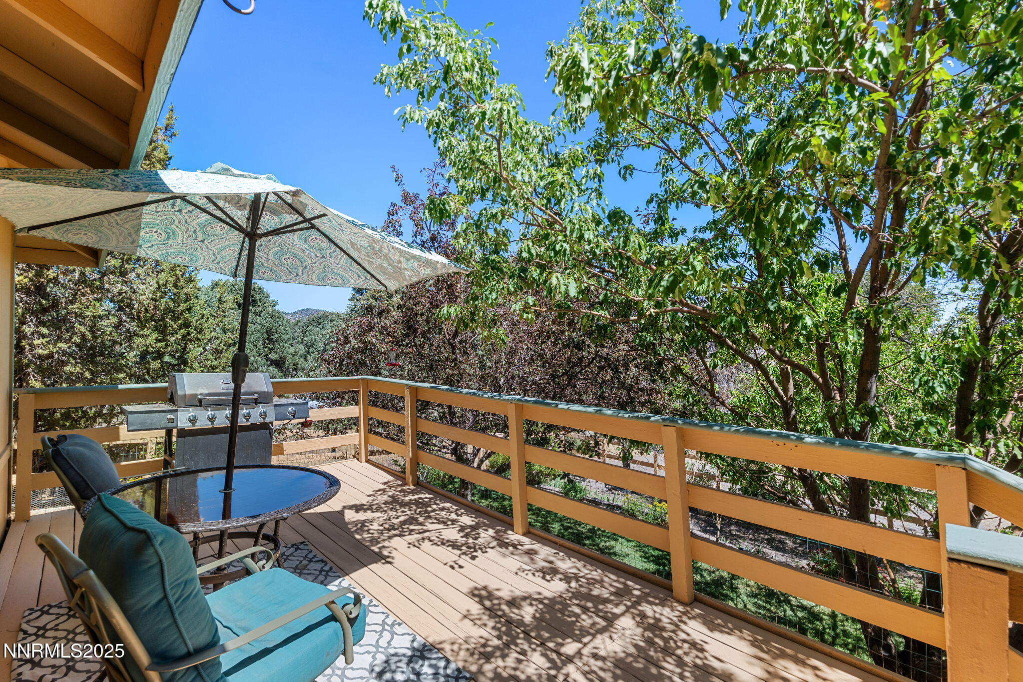 21615 Dortort Drive Reno, NV 89521 - Photo 7 of 52 a view of a chairs and table in the wooden house