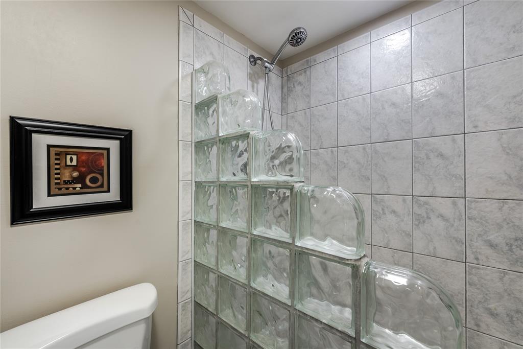 1401 South Federal Highway, Unit 122 Boca Raton, FL 33432 - Photo 18 of 29 a bathroom with a shower and toilet