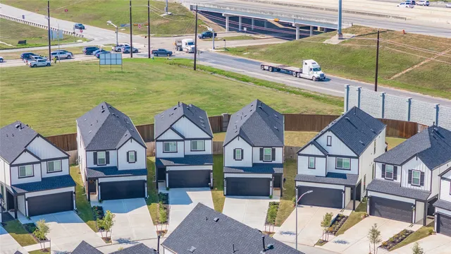 a view of house with outdoor space swimming pool and furniture