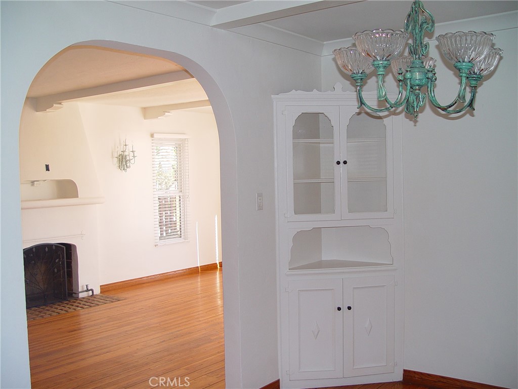125 7th Street Manhattan Beach, CA 90266 - Photo 7 of 20 a view of livingroom with kitchen island with wooden floor