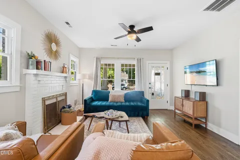 a living room with furniture or couch and a window