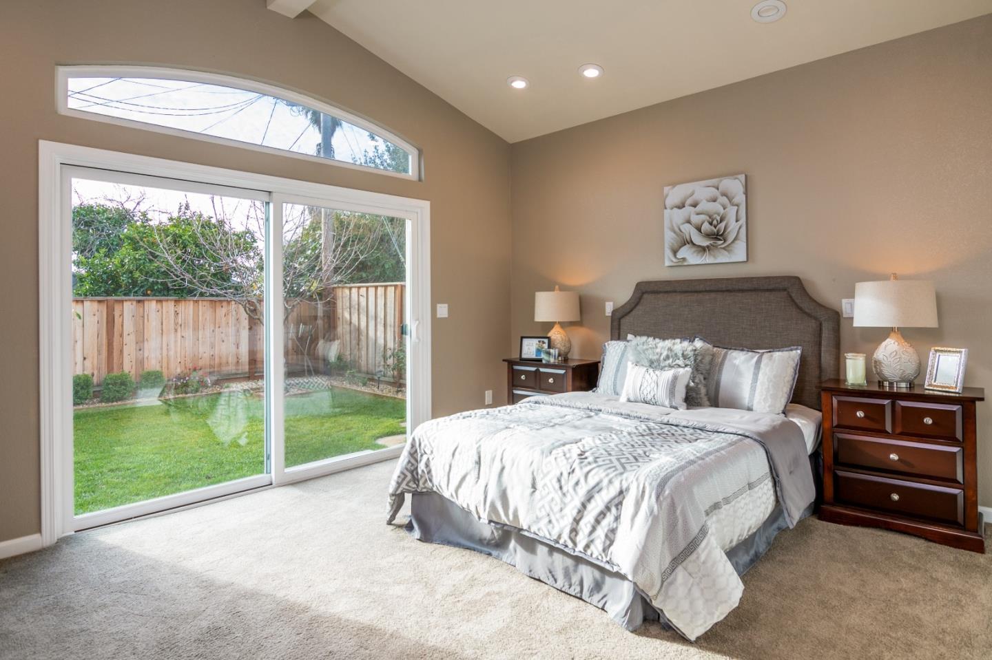 464 Greathouse Drive Milpitas, CA 95035 - Photo 15 of 27 a bedroom with a bed and a large window