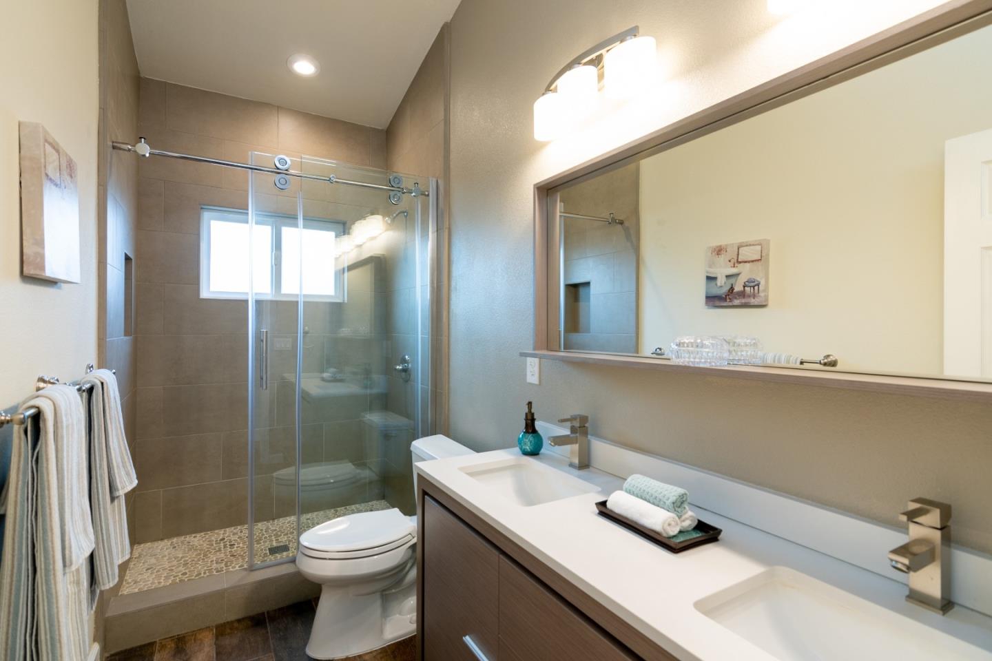 464 Greathouse Drive Milpitas, CA 95035 - Photo 16 of 27 a bathroom with a sink toilet and shower