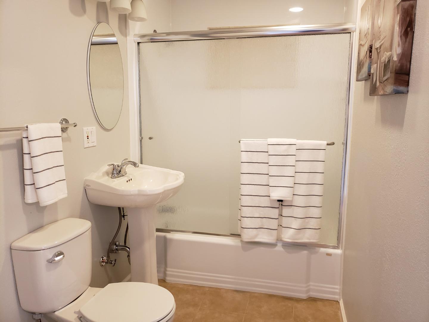 464 Greathouse Drive Milpitas, CA 95035 - Photo 17 of 27 a bathroom with a sink a toilet and shower