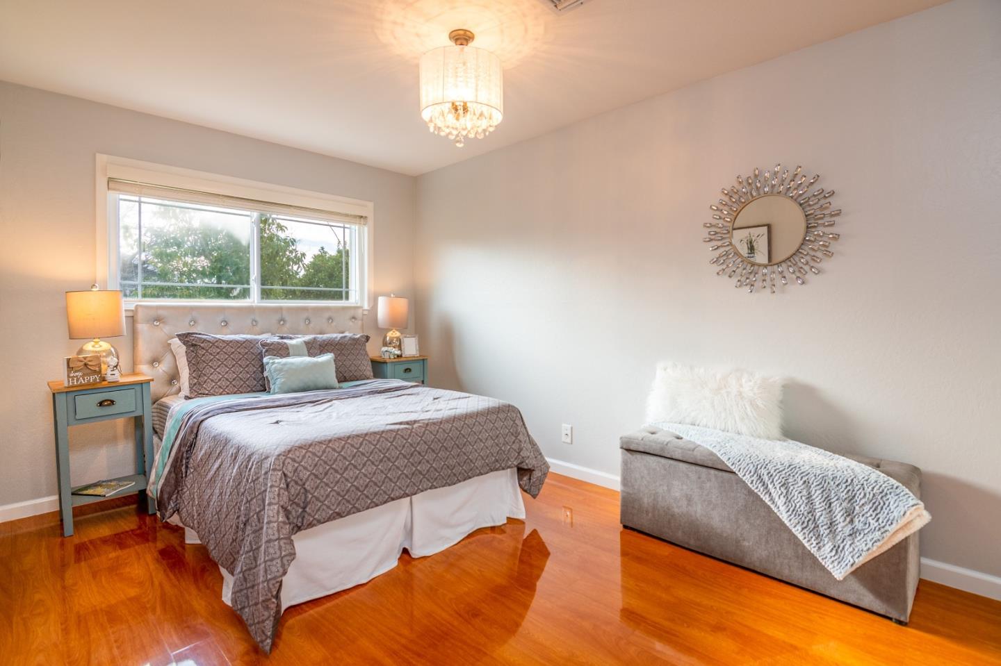 464 Greathouse Drive Milpitas, CA 95035 - Photo 18 of 27 a bedroom with bed and window