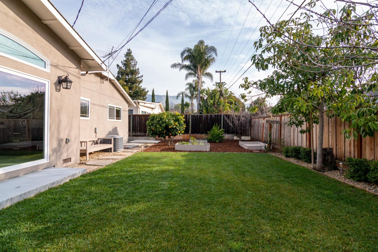 464 Greathouse Drive Milpitas, CA 95035 - Photo 26 of 27 a view of a patio with couches chairs and a big yard
