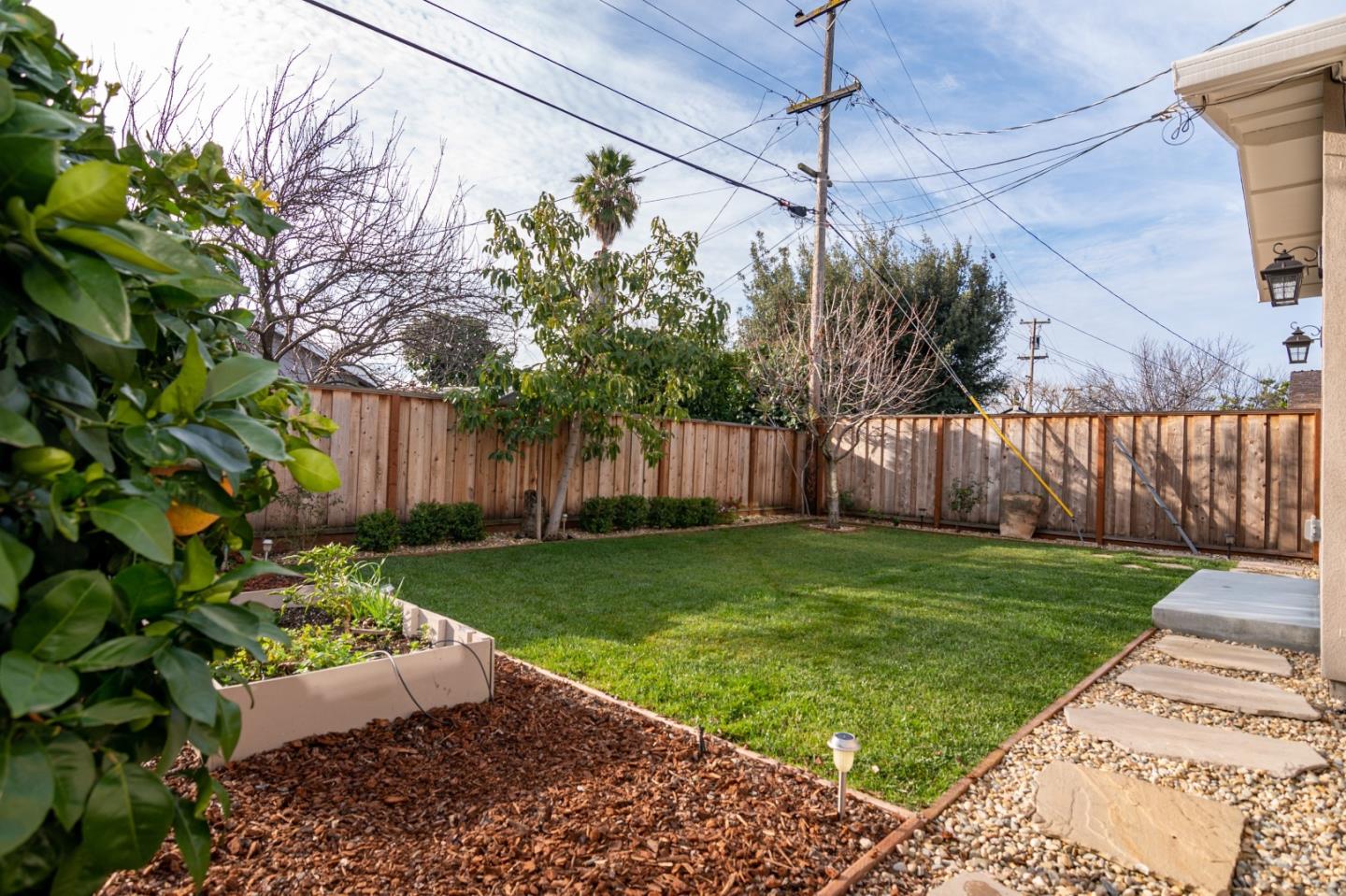 464 Greathouse Drive Milpitas, CA 95035 - Photo 27 of 27 a backyard of a house with lots of green space