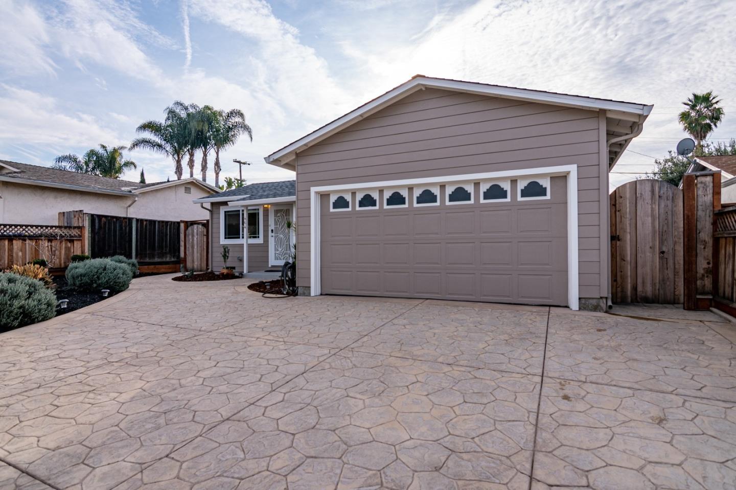 464 Greathouse Drive Milpitas, CA 95035 - Photo 3 of 27 a front view of a house with a garage
