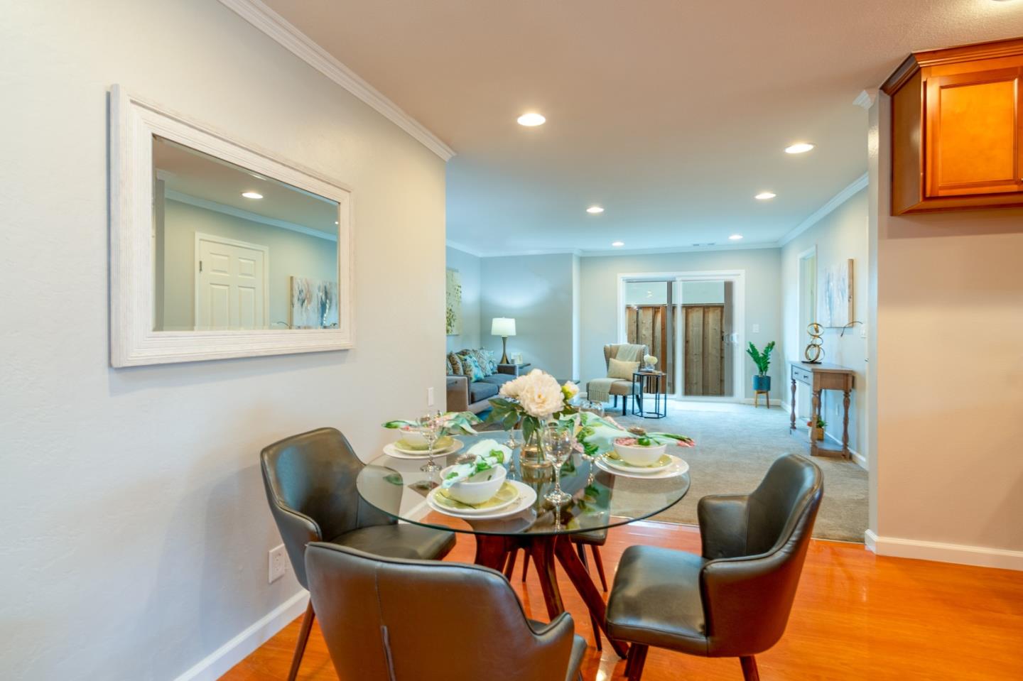 464 Greathouse Drive Milpitas, CA 95035 - Photo 9 of 27 a view of a dining room with furniture and a potted plant