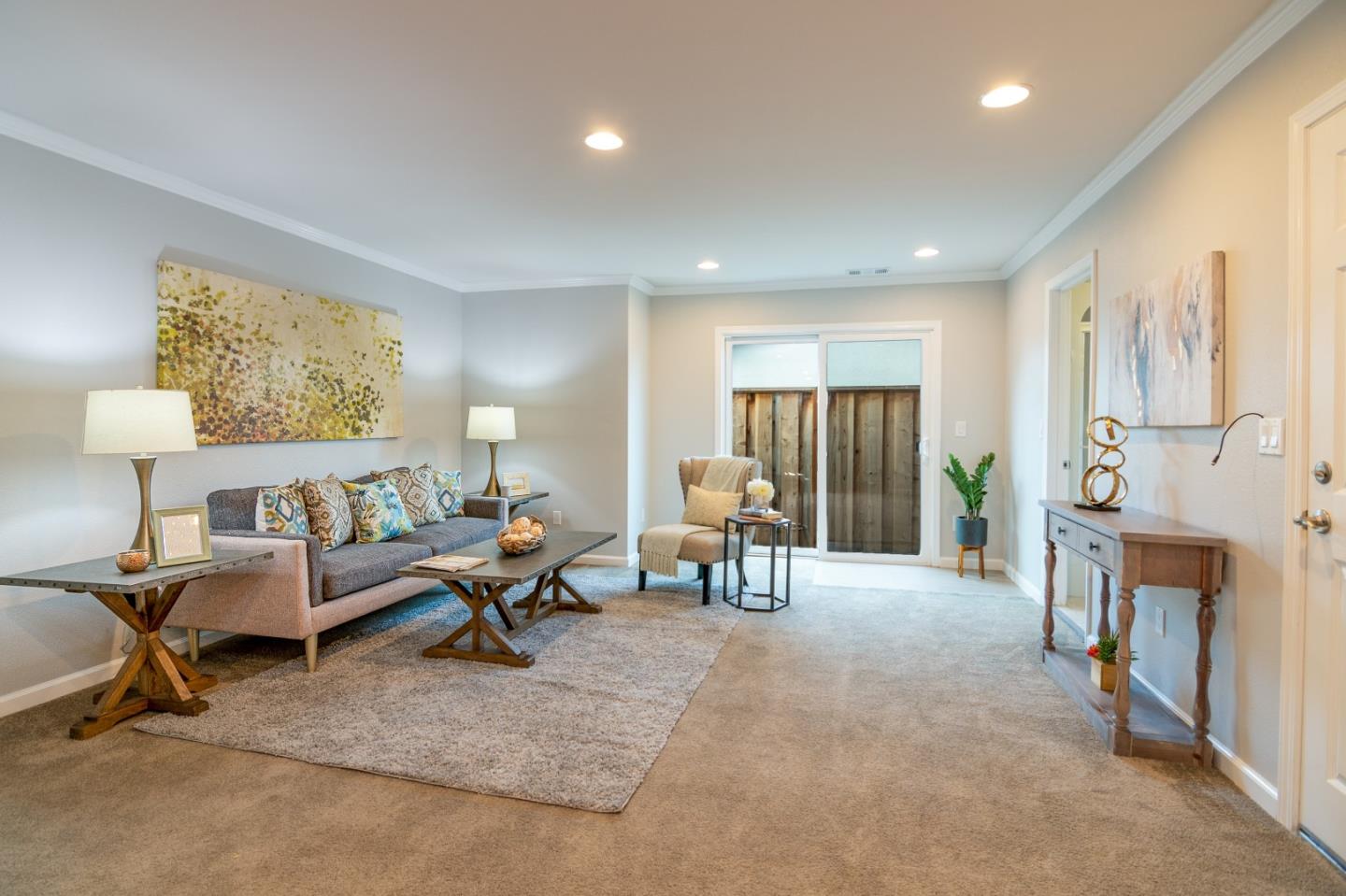 464 Greathouse Drive Milpitas, CA 95035 - Photo 10 of 27 a living room with furniture a fireplace and a large window