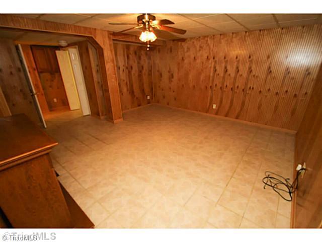 436 Farmstead Road Winston-Salem, NC 27107 - Photo 14 of 21 Den/Family/Great Room. Wired for surround sound! So many uses of this space. Separate Room wired with 220 amp for tanning bed or workshop.