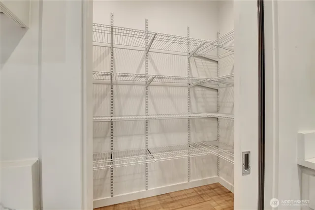 a view of a room with racks on the wall