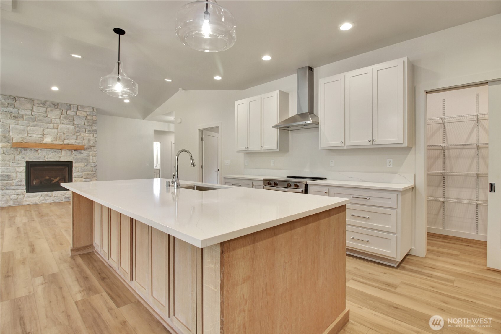 36817 State Rte 530 Northeast Arlington, WA 98223 - Photo 15 of 40 a kitchen with kitchen island a sink stainless steel appliances and cabinets